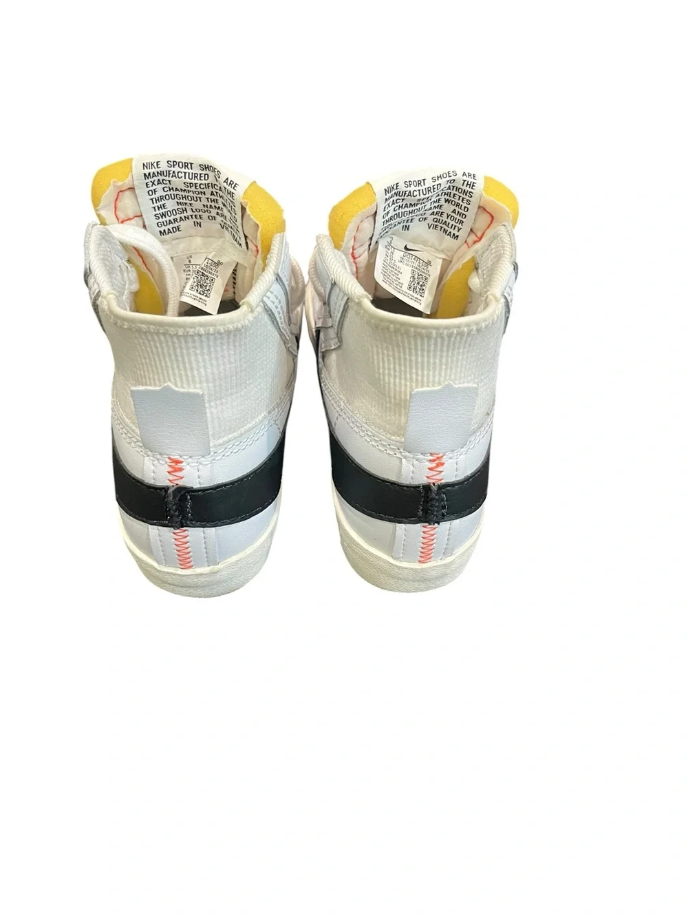 Nike Blazer Mid '77 Jumbo sneakers in a white and orange colorway